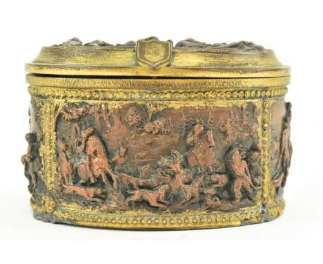 A vintage French Continental electrotype gilt metal trinket box. The oval shaped box decorated with relief figurines with tur