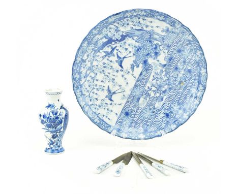 A group of three blue and white ceramic pieces. The lot includes a Delft ceramic miniature baluster-shaped vase hand painted 
