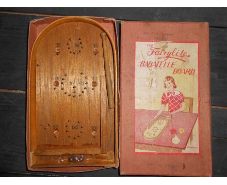 Bagatelle Board, just 7 x 4 inches circa 1930s, wooden with nail guide pins, ball bearings and wood pushing stick, boxed Rese