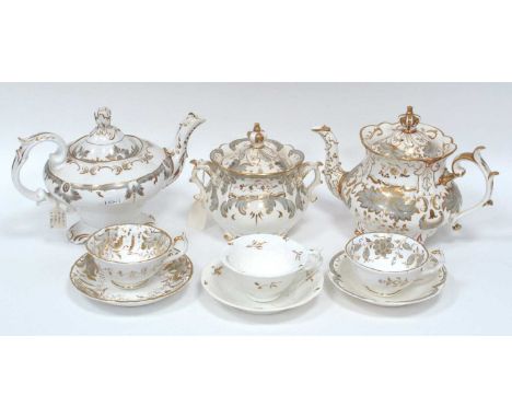 A Rockingham Porcelain Teapot and Cover and Matching Sucrier and Cover, with crown finials, decorated in grey and gilt with f