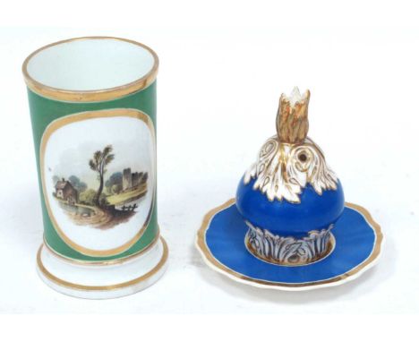 A Rockingham Porcelain Candle Holder and Pierced Cover, decorated in blue and gilt, the cover moulded with foliage, red mark,