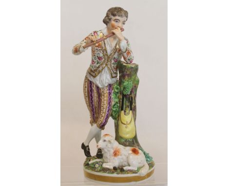 Early 19th century Bloor Derby porcelain figure of a shepherd playing a flute, resting on a tree trunk with sheep at foot, de