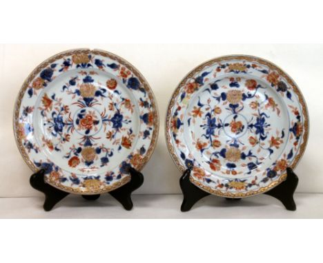 Pair of 18th century Chinese Imari plates with floral decoration, double ring & leaf mark to base, each 22cm diam.  (2).