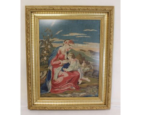 Victorian polychrome woolwork tapestry picture depicting a classical scene with mother & child, 47cm x 35.5cm, in foliate mou