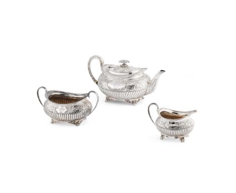 Y A late Victorian three-piece tea service   Henry Atkin, Sheffield 1893, comprising teapot, twin handled sugar basin and a m