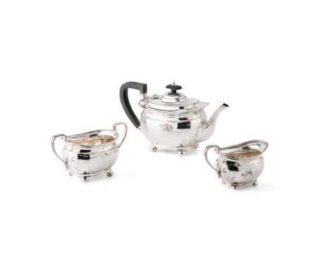 A matched George V three-piece tea-service Atkin Brothers, Sheffield 1919/20, comprising a teapot, twin-handled sugar basin a