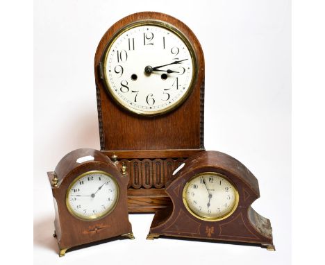 An enamelled dialled Oak Mantle clock circa 1920, two Edwardian inlaid mantle clocks (3)