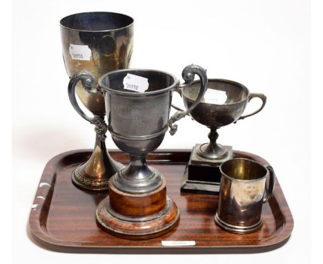 Two silver twin handled trophy cups, a small silver tankard, a silver plated goblet, (4)