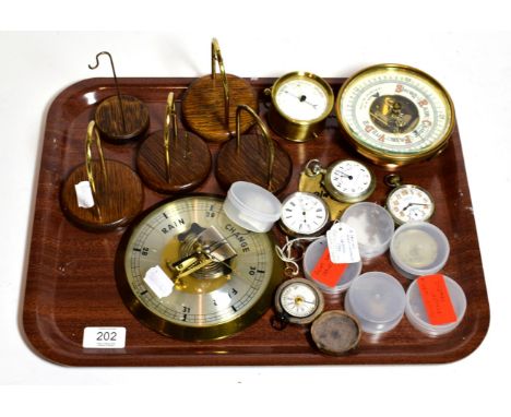 An open faced pocket watch, case stamped 935, two nickel cased pocket watches, pocket damp/detector barometer, two metal case
