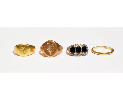 A 9 carat gold signet ring, finger size M (marks rubbed but visible); a 9 carat gold band ring, finger size K; a 9 carat gold