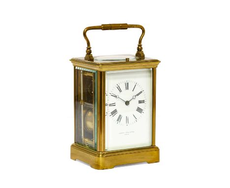 A Brass Striking and Repeating Carriage Clock, retailed by Joseph Penlington, Paris, circa 1900, carrying handle and repeat b