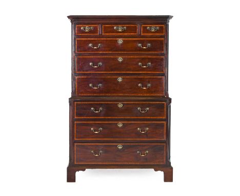 A George III Mahogany, Tulipwood-Banded and Boxwood-Strung Chest on Chest, early 19th century, the moulded cornice above thre