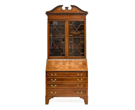 An Edwardian Mahogany, Satinwood Banded and Marquetry Inlaid Bureau Bookcase, in Sheraton Revival style, the moulded pediment