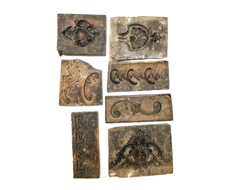 A Collection of Seven English 19th Century Boxwood Moulds, including cartouche corners, leaf and scroll (7)