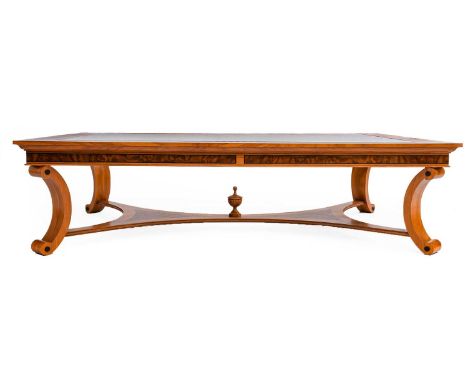 Neal Jones: A Contemporary Burr Walnut Rectangular Coffee Table, with plate-glass top above C scrolls joined by a flattened s