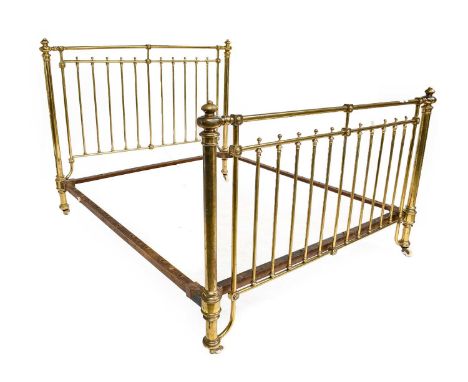 ~ A Victorian Lacquered Brass Bedstead, 3rd quarter 19th century, the tubular railed headboard and footboard with metal finia