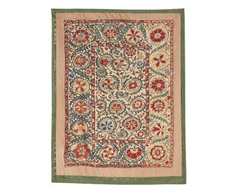 SUSANI UZBEKISTAN, 19TH CENTURY made up of three joined strips, depicting roseheads and carnations within leaves on a light c