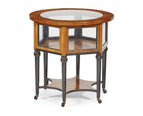 BIEDERMEIER STYLE BURR WALNUT AND EBONISED BIJOUTERIE TABLE EARLY 20TH CENTURY the circular glazed top above hexagonal glazed