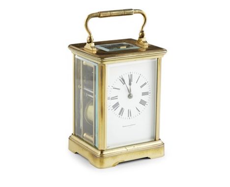 FRENCH BRASS CARRIAGE CLOCK 20TH CENTURY the bevelled-glass corniche case enclosing a white enamelled dial with Roman numeral