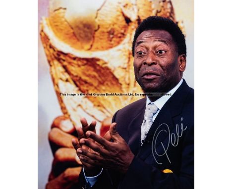 Pele signed large colour photoprint,portrait against a backdrop featuring an enlarged image of the FIFA World Cup Trophy, mou