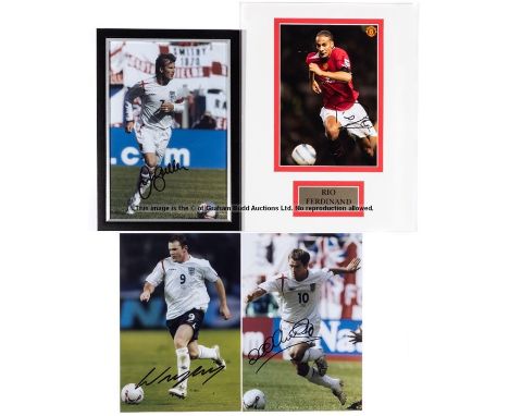 Group of four signed colour photographs of Manchester United and England players,comprising David Beckham, Wayne Rooney, Mich