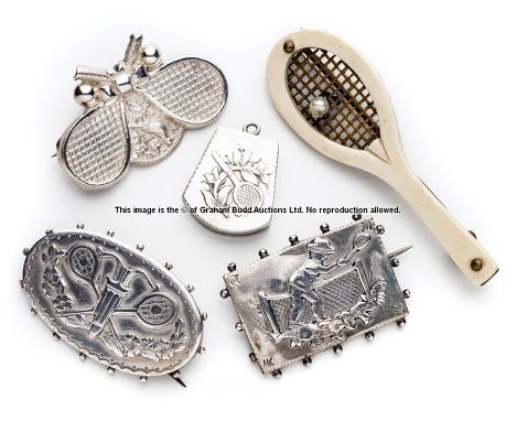 Five unusual tennis brooches and locket,a rare combined tennis and archery oval brooch; a silver locket hallmarked Birmingham