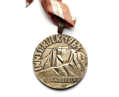 Innsbruck 1964 Winter Olympic Games first place gold prize medal awarded to Josef Feistmantl of Austria for the Men's Luge Do