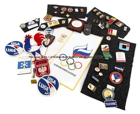 Group of metal and enamel badges for winter sports World Championships and other international competitions,including Tokyo 1