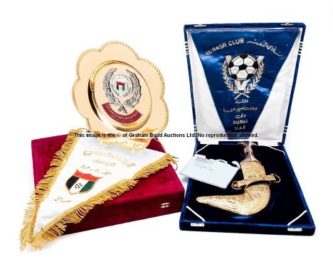 Group of presentations to Les Cocker from UAE F.A. and Al-Nasr F.C., comprising a large cased silvered gilt and metal lobed p