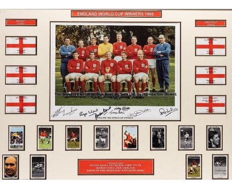 Signed 1966 England World Cup winners team photograph, signed by eight of the team in black marker pen Banks, Wilson, Stiles,