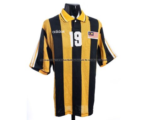Azman Adnan Malaysia yellow & black striped No.19 jersey from the friendly match v Arsenal played at the National Stadium, Bu