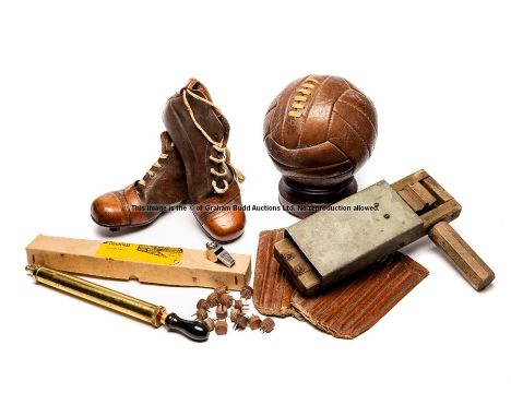 Vintage football equipment, comprising a pair of unused leather football boots, size 6, with leather studs and spares; a leat