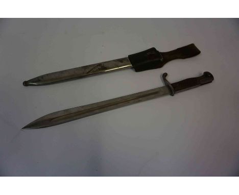 A German Move-Werke Bayonet by Walter &amp; Co, blade 36.5cm long, in a metal scabbard