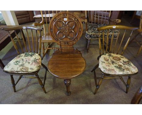 A Walnut Hall Chair, Having a spoon back rest with a carved floral panel, raised on turned legs, 94cm high, also with a pair 