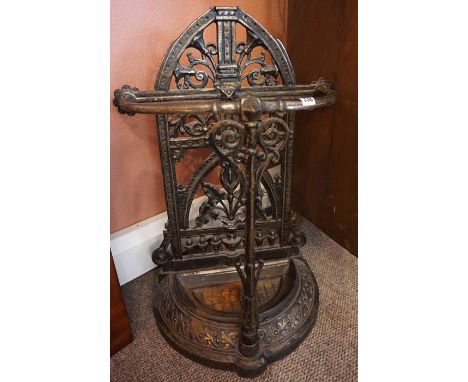 A Victorian Style Cast Iron Stick Stand, Decorated with scrolls and swags, with drip tray, 78cm high 