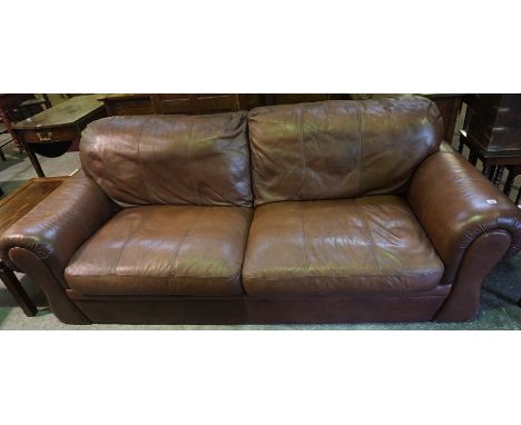 A Brown Leather Sofa, approximately 227cm wide