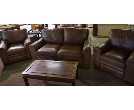 A Contemporary Tan Leather Three Piece Lounge Suite, comprising of a large two seater sofa and a pair of armchairs, sofa appr