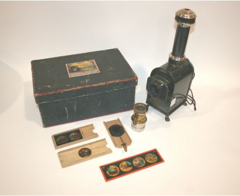 GEBRUDER BING MAGIC LANTERN & SLIDES a boxed Gebruder Bing tin plate Magic Lantern, with slots inside for 12 slides (all pres