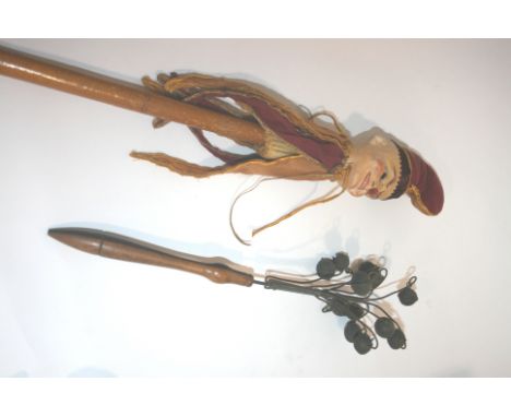 MR PUNCH PUPPET a puppet of Mr Punch, with a painted face and clothing and mounted on a wooden stick. Also with a group of sm
