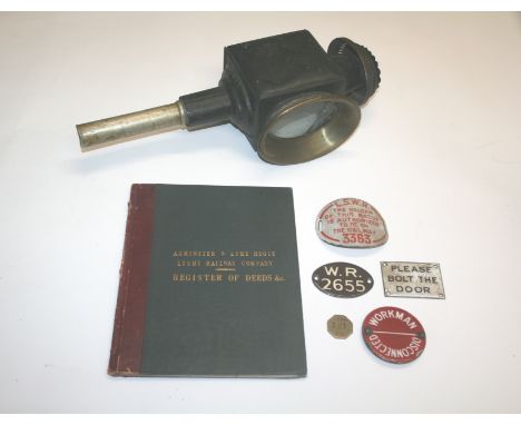 RAILWAY ITEMS including a Axminster & Lyme Regis Light Railway Company Register of Deeds, dated 1900 with some pages with wri
