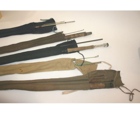FISHING RODS including a J A Walker 3 piece split cane rod with two tops, a 3 piece split cane rod by Manton & Co with a spar