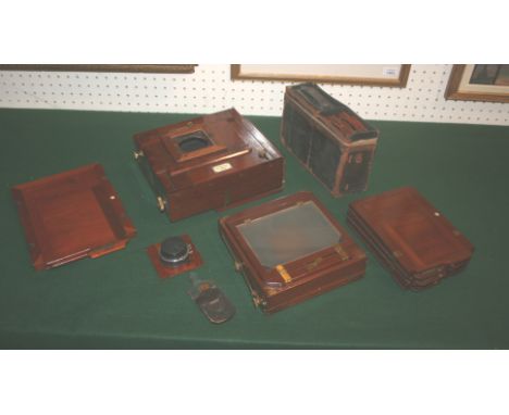 EARLY PLATE CAMERA a mahogany plate camera by W Watson & Sons, also with a small cased plate camera with additional plates, a
