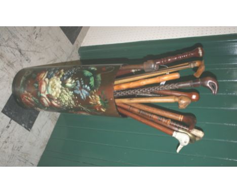 STICK STAND & STICKS - CEYLON 1901 a wooden stick stand painted with a variety of flowers. With a variety of walking sticks i
