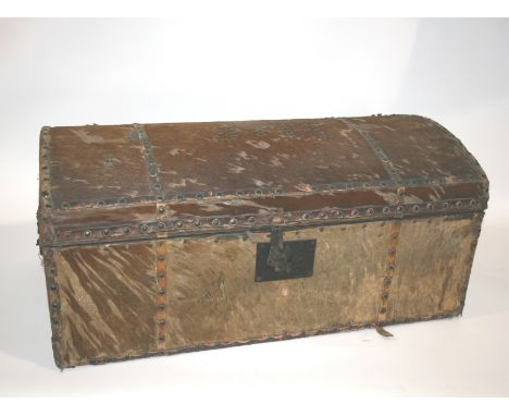 19THC DOME TOP TRUNK a wooden and animal hide trunk, with metal stud decoration including initials on the top. With the remai