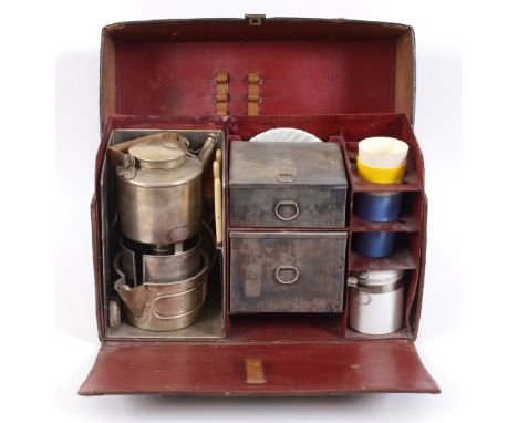 LEATHER CASED TRAVELLING PICNIC SET a fitted leather case containing a kettle and burner, sandwich tins, plates and cutlery, 