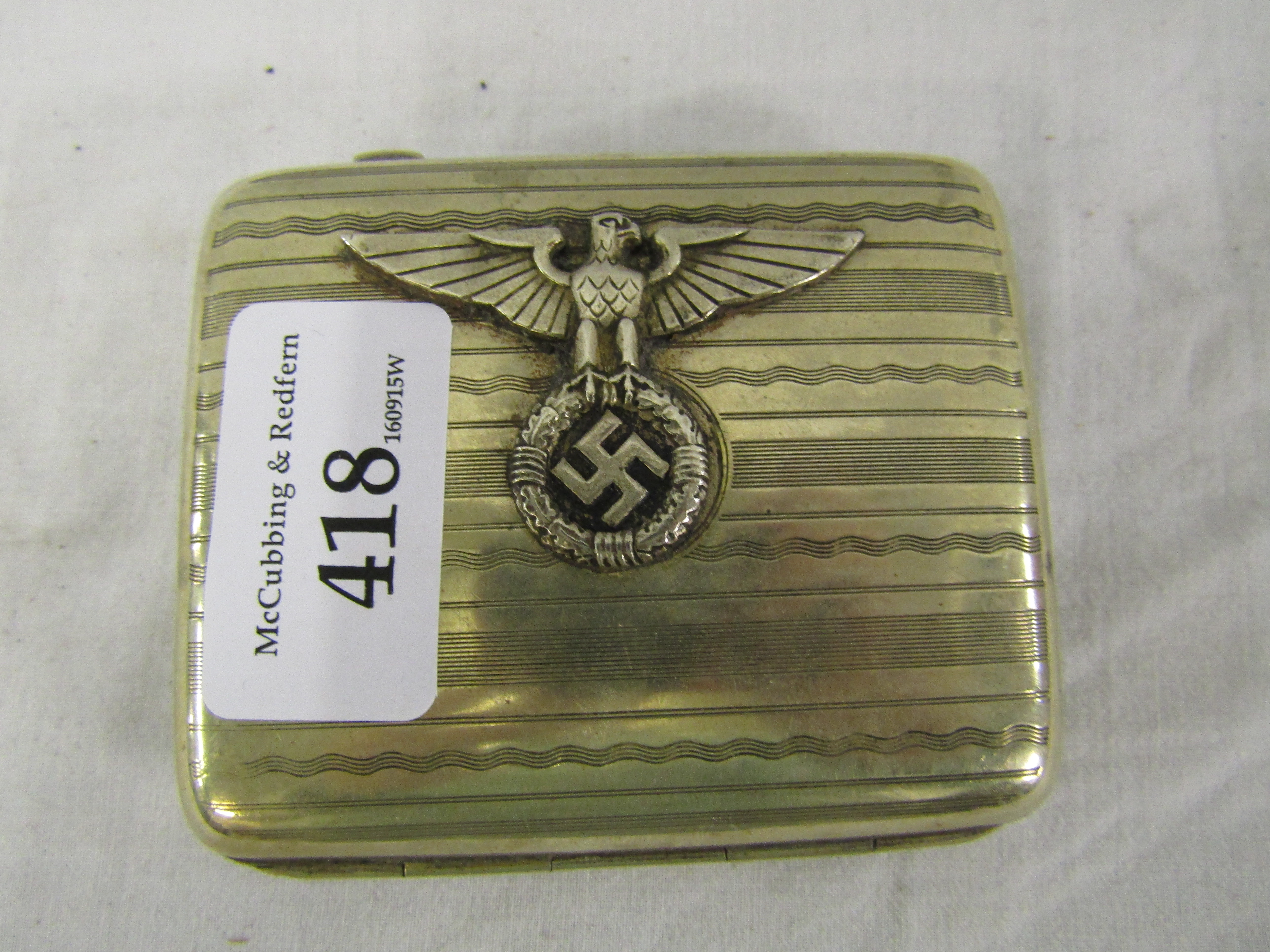 WWII German cigarette case embossed with eagle and swastika, German
