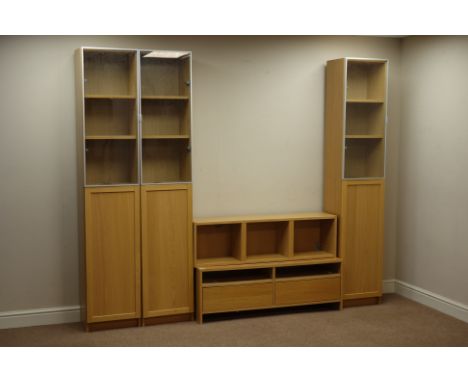 'Billy' light oak finish five piece wall unit, three tall narrow cabinets, wall hanging shelves and television stand with two