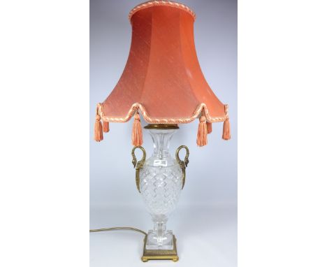 Cut glass and gilt metal table lamp with swan neck arms, H40cm excluding shade    Condition Report   Click here for further i