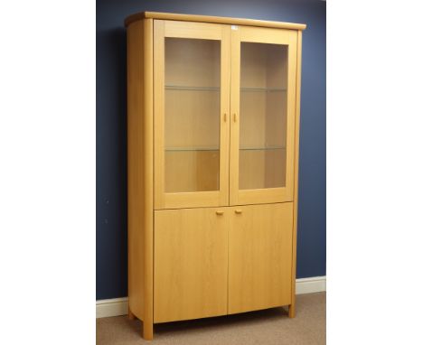 Skovby light oak illuminated display cabinet, two glazed doors above cupboard, W114cm, H197cm, D49cm   Condition Report   Cli