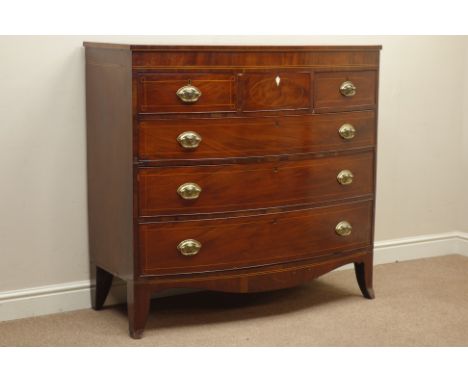 Early 19th century bow front mahogany chest, three short drawers over three long drawers, shaped apron, splayed bracket feet,